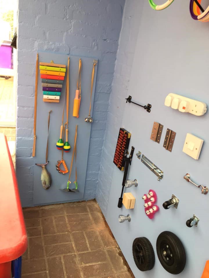 Percussion Instruments hung on a wall